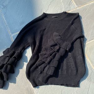 Super cute black sweater with ruffles